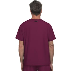 A maroon-coloured top featuring a simple design and a logo on the back.