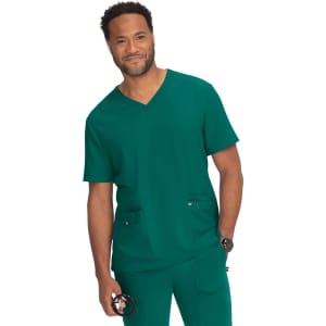 A medical scrub top in a vibrant teal colour, featuring a V-neck design and two front pockets.