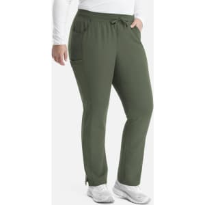 A pair of tapered women's yoga pants in dark green, featuring a waistband and side pockets.