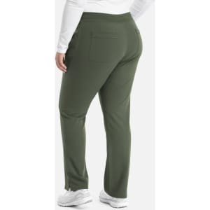 A pair of tapered women's yoga pants in olive green, featuring a pocket and a logo on the waistband.