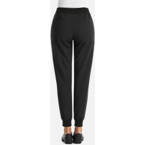 A pair of women's black joggers featuring a full waist and metallic detailing at the waistband and pockets.