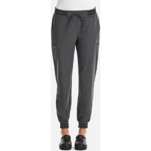 A pair of women's joggers in dark grey with metallic detailing and elastic cuffs, featuring a drawstring waist.