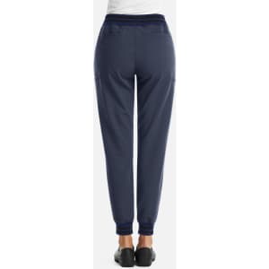 A pair of women’s jogger pants in navy blue with a full waist design and metallic detailing, featuring two back pockets.