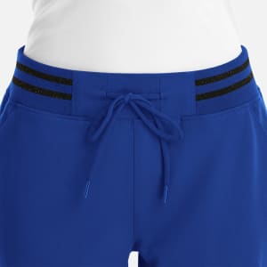 Full waist jogger in blue with metallic black detailing on the waistband and adjustable tie.