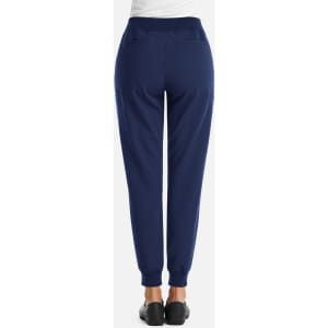 A pair of women's full waist joggers in navy, featuring a fitted design and pockets at the back.