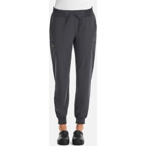A pair of women's joggers in dark grey with a fitted waist and cuffs, featuring pockets and a branding logo.