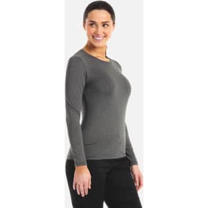 A grey long-sleeve underscrub tee for women, featuring a fitted design and a branding logo.