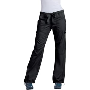 A pair of black pants with a relaxed fit, featuring a drawstring waist and side pockets. The model is wearing blue shoes.