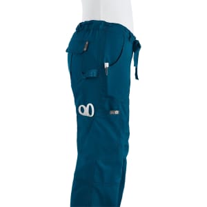 A pair of teal pants with multiple pockets and a logo, displayed from the side.