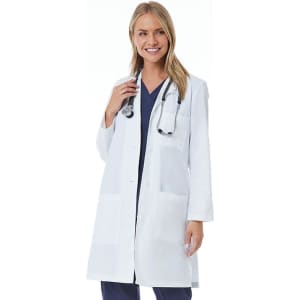A woman wearing a full-length white lab coat with pockets and a stethoscope around her neck.
