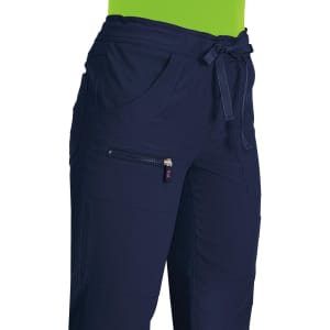Navy blue pants with pockets and a drawstring waist; features a logo.