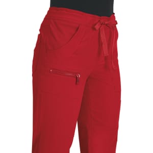 Red pants with a drawstring waist, pockets, and a zippered pocket on the side. The fabric appears soft and casual.