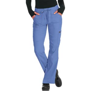 A pair of women's relaxed fit pants in light blue, featuring pockets and a drawstring waistband.