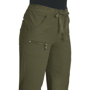 An olive green pant featuring a drawstring waist and multiple pockets, including a zippered side pocket.
