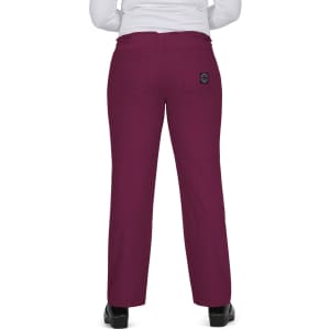 Maroon pants with a back pocket and a small logo, worn by a person facing away.