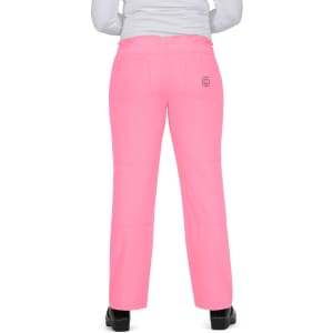 A pair of bright pink pants with a logo, viewed from the back, featuring a relaxed fit and straight legs.