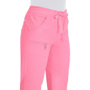A pair of pink pants with pockets and a drawstring waist, featuring a zippered detail.