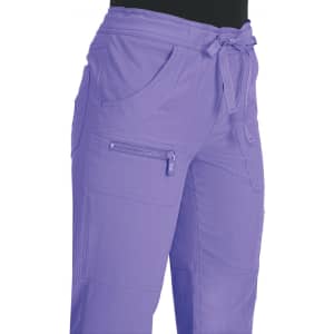 A pair of purple pants with pockets and a drawstring waist, featuring a logo on the side.