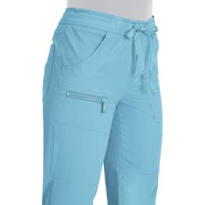 Light blue pants with a tie waist and multiple pockets, featuring a zippered pocket.