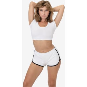 White sports shorts with black trim, modelled with a matching cropped top. The style is casual and athletic.
