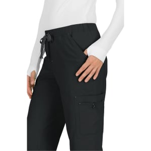 Black pants with pockets and a drawstring waist, displayed on a person wearing a long-sleeve white top.