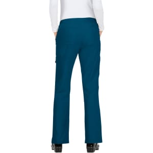 A pair of teal pants with a flared bottom and pockets, featuring a logo on the side.