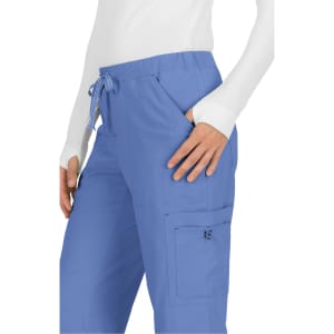 A pair of blue pants with a drawstring waist and side pockets, displayed on a model.