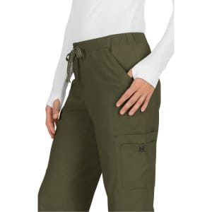 A pair of olive green pants with side pockets and an adjustable drawstring waistband. Features a logo on the pocket.