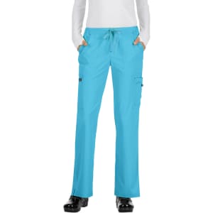 A pair of turquoise pants with pockets, featuring a drawstring waist and worn with a white long-sleeve top.