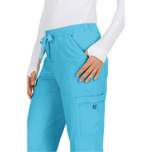A pair of women's pants in bright blue, featuring a drawstring waist and side pockets. The pants have a logo on them.