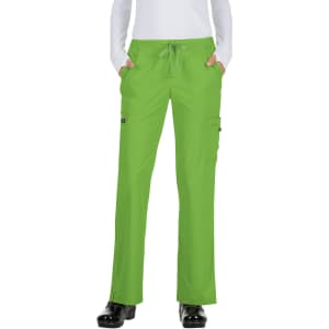 A pair of bright green pants with a drawstring waist and multiple pockets. The model is wearing black shoes.