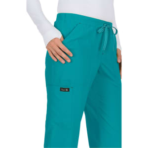 A pair of teal scrubs with a drawstring waist and pockets, featuring a logo on the side.