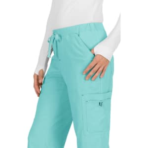 A pair of aqua blue pants with a drawstring waist and side pockets. The fabric appears lightweight.