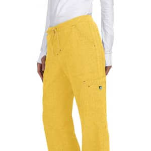 Holly Pant in bright yellow with a drawstring waistband and side pockets, featuring a small logo on the pocket.