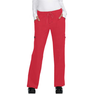 Red pants with a drawstring waist and pockets, worn by a model with hands in pockets, featuring a logo.