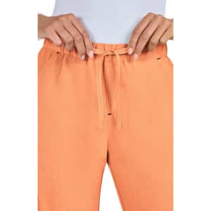 An orange pair of pants with a drawstring waist, showcasing a close-up of the waist detail.