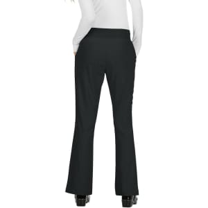 A pair of black pants featuring a flared design, viewed from the back, against a plain background.