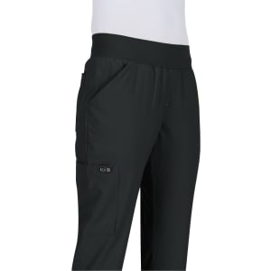 A pair of black pants featuring a wide waistband and pockets, with a logo on the side.