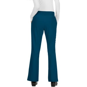 A pair of teal trousers with a flared leg design, featuring pockets and a fitted waistband.