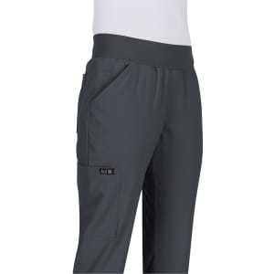 A pair of dark grey pants with a wide waistband and side pockets, featuring a logo on one leg.