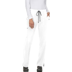 White pants with a drawstring waist, featuring pockets and a relaxed fit. The model stands in black footwear.