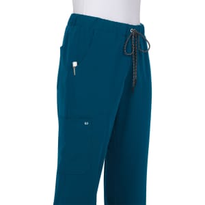 Teal pants featuring an elastic waistband, pockets, and a drawstring closure. Includes a logo on the side.
