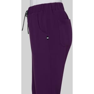 A pair of purple pants with an elastic waistband, featuring a pocket and a drawstring detail.