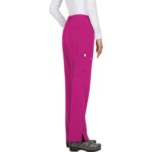 A pair of bright pink pants with a relaxed fit and side pockets, displayed on a model.