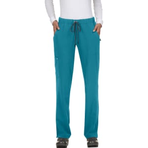Teal pants with a drawstring waist, featuring pockets and a logo on the side, worn by a model.