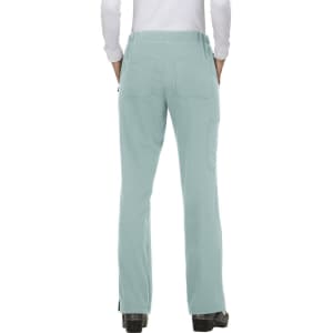 A pair of mint green trousers with pockets, featuring a plain design and a logo on the back.