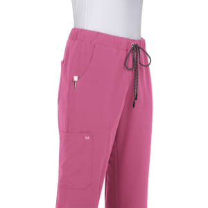 A pair of pink pants featuring an elastic waistband, drawstring, and pockets. The product has a logo on it.