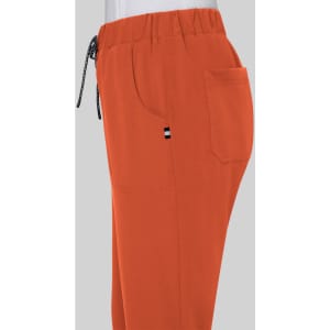 Cotton jogger pants in a vibrant orange colour with an elastic waistband and side pocket. Features a logo.
