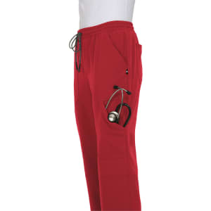 A pair of red jogger pants with an elastic waistband and a pocket holding a stethoscope, featuring a logo.