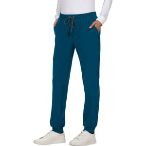 A pair of teal jogger pants with an elastic waistband and side pockets, featuring a logo.